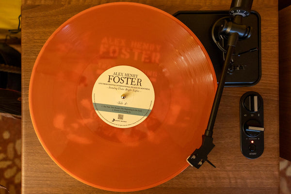 “Standing Under Bright Lights” [Triple LP Vinyl - Widespine - Translucent Orange]