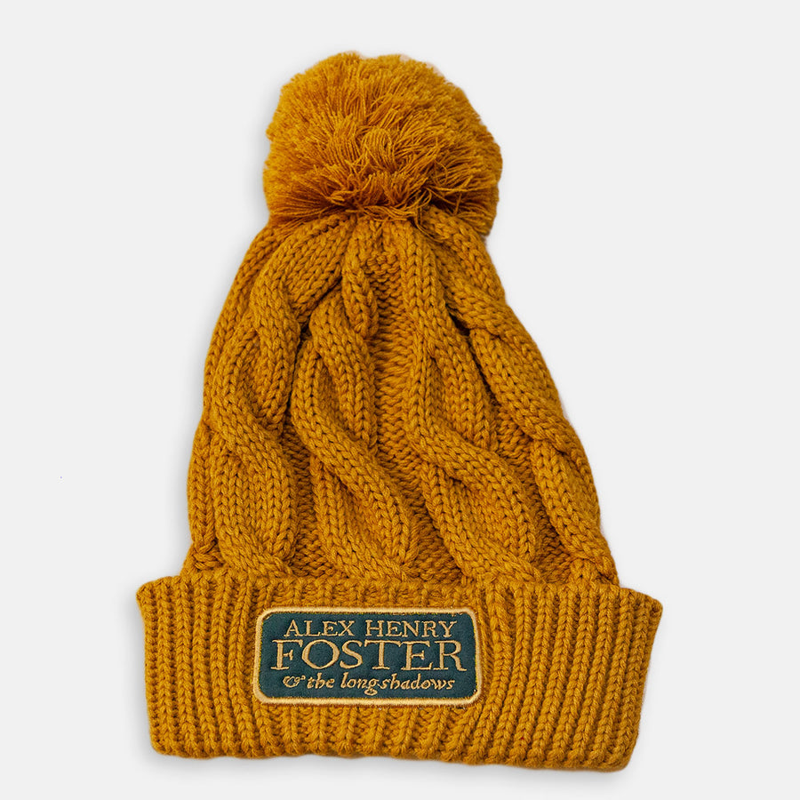 “Perpetual Glimmer” Pompom Cable-Knit Beanie - Golden Yellow